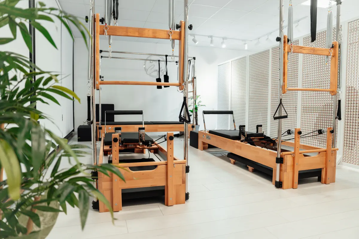 The reformer room: Eight maple reformers and two towers under north light.